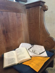 Open books for use in sevices on pew.